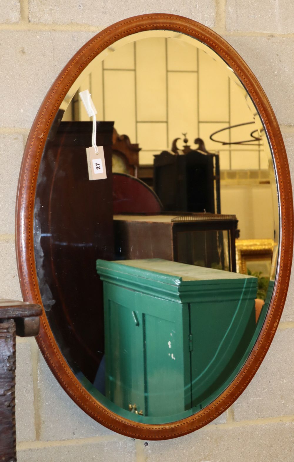 A plaster pedestal and an Edwardian oval mirror, pedestal H.89cm